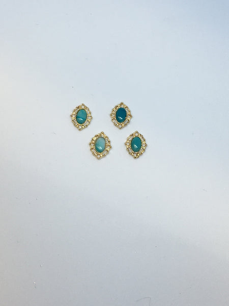 Teal Gems in Gold Setting (2)